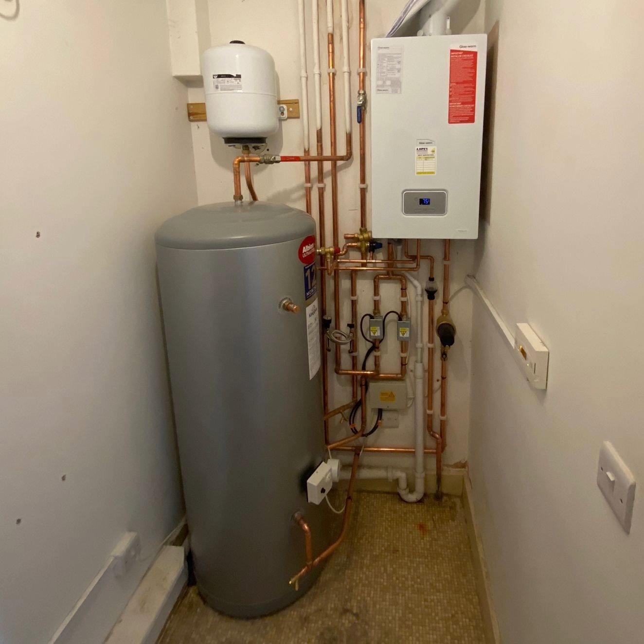 Domestic boiler with copper pipes expertly fitted.